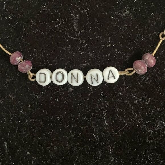 15” All About You gold tone Figaro chain necklace with “Donna” spelled in beads - Picture 3 of 8